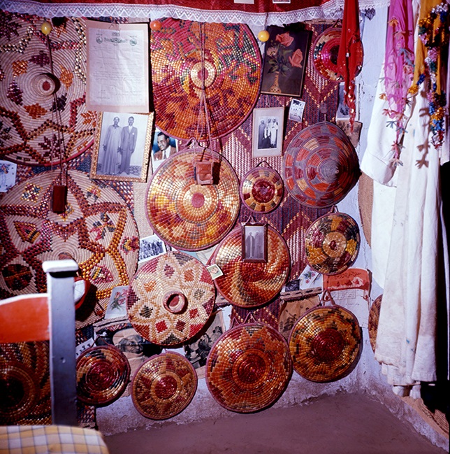 Photos of male family members on the wall of a bridal room. Shellaal, Bijje island, 1964 (Photographed by the author).