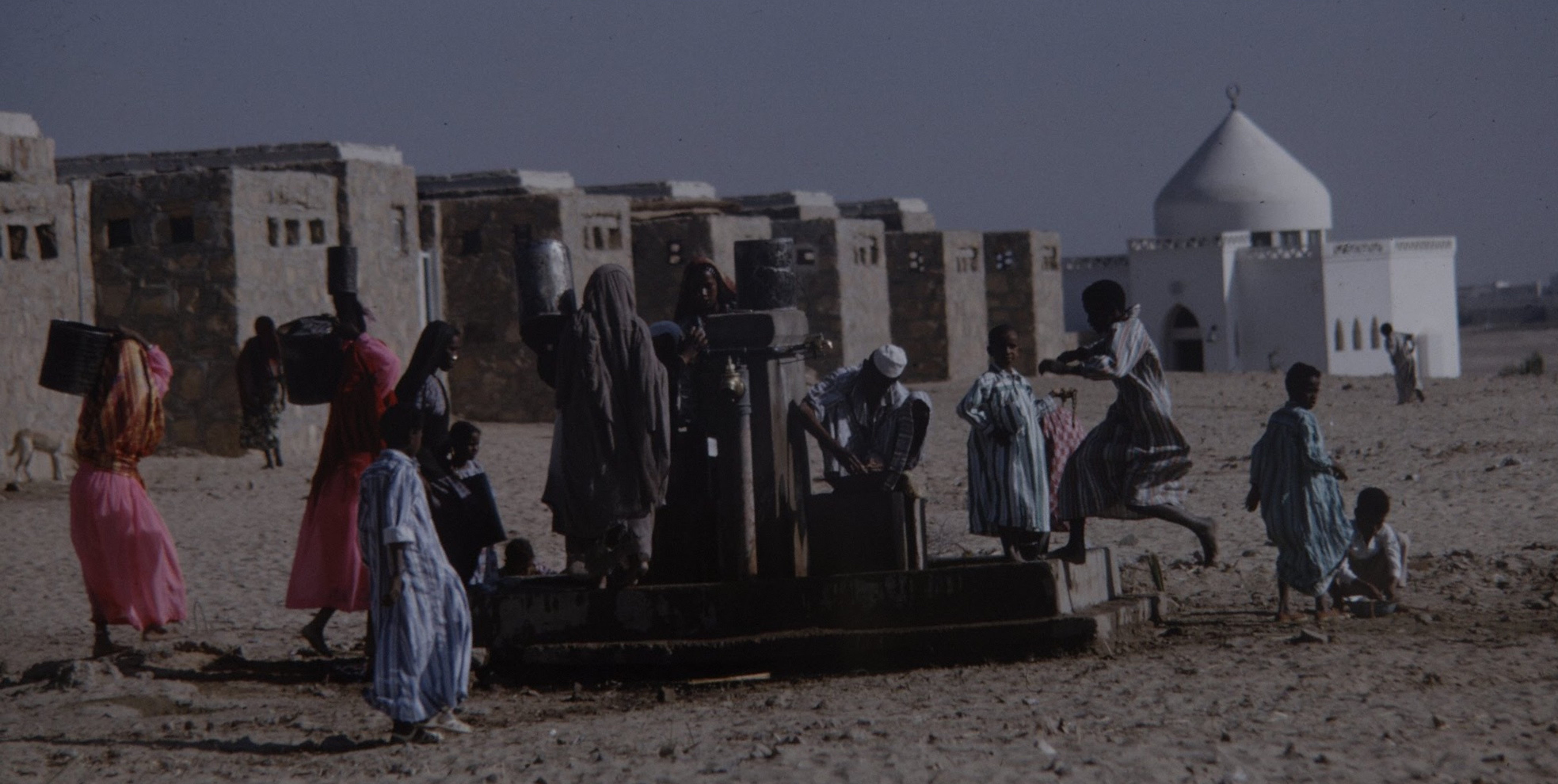 Governmental houses and the communal tap of <em>Kalabsha</em> and <em>Abu Hor</em> in New Nubia, as well as a new shrine built by the people of <em>Kalabsha</em>. Photo by Ralph Crane (1964). Courtesy of the LIFE Picture Collection.
