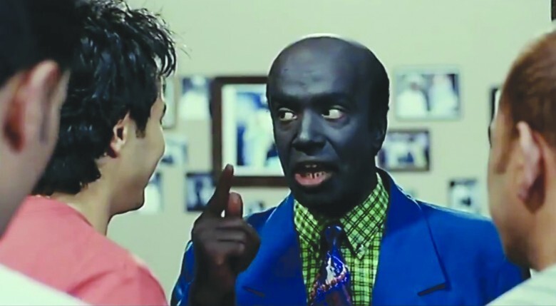 The screenshot shows a non-Nubian actor named Soliman Eid in blackface pretending to be Nubian. Source: ʕija:l ħabiba &rsquo;love birds&rsquo; (2005).