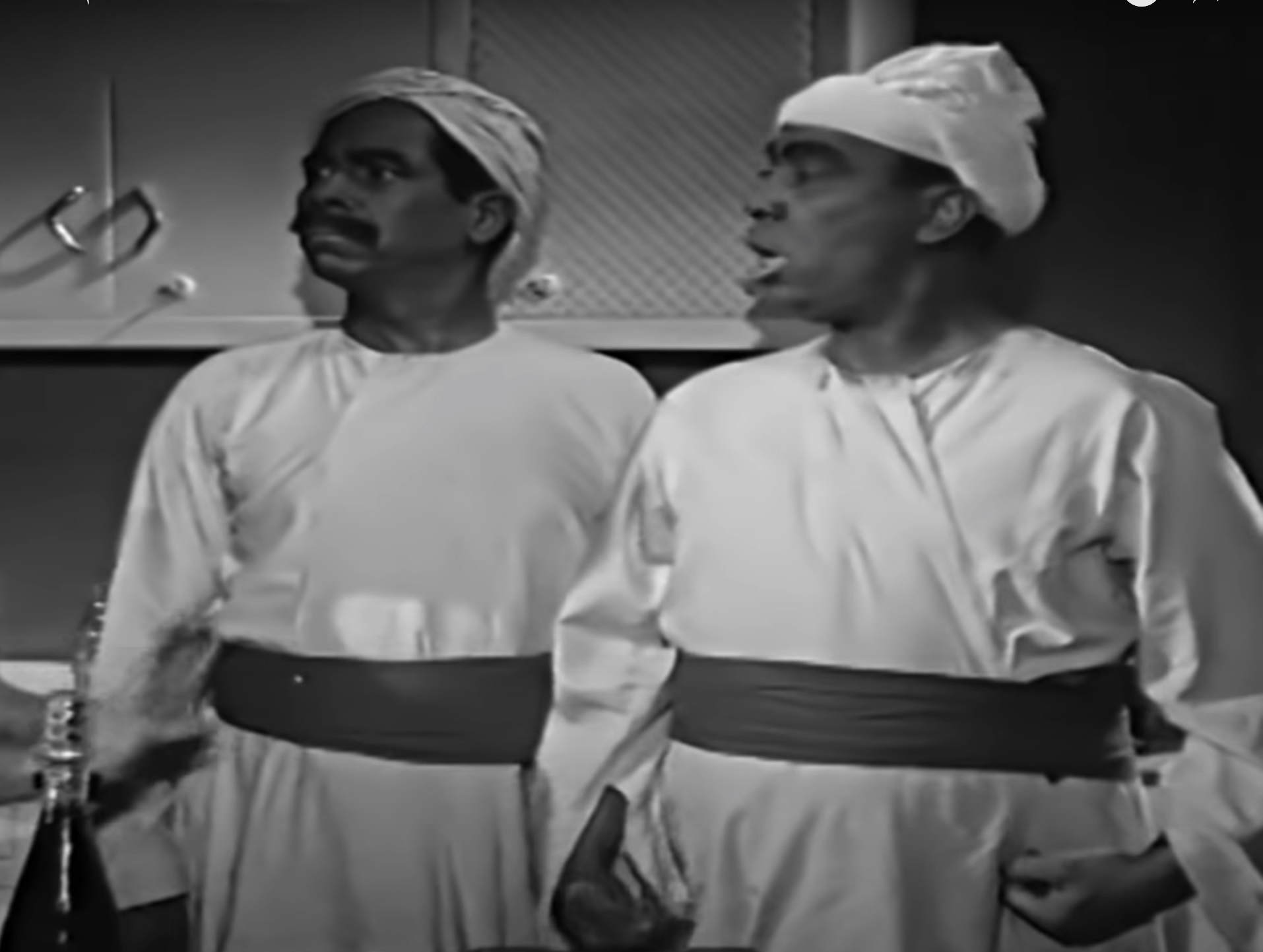 An example of the pictures shown to the participants to start the discussion. The image depicts two characters — Ismail Yassine on the right and Abdel Ghani El Nagdi on the left — who painted their faces black to impersonate Nubians. Source: Ilfa:nu:s ʔa-siħirj  ‘The Magic Lantern’ (1960).