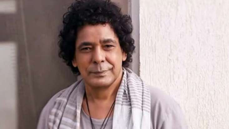 A picture of Mohamed Mounir, a Nubian Egyptian legend singer and actor. Source: Google (2022).